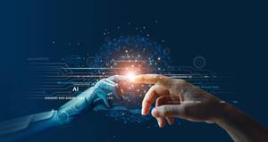 hand eines roboters trifft menschliche hand
