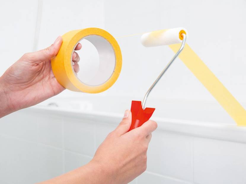 Tipp: Rollen Sie die neue Rolle über Klebeband, um Fusseln zu entfernen.