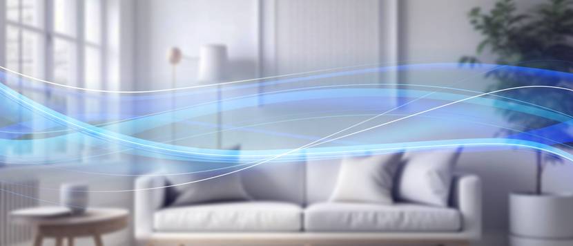 Durch blaue Wellen wird frische Luft symbolisiert. Im Hintergrund ist ein modern eingerichtetes Schlafzimmer abgebildet.