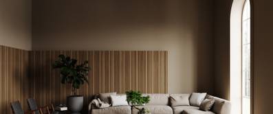 Minimalistische Wohnzimmereinrichtung mit Akustikpaneelen an der Wand.