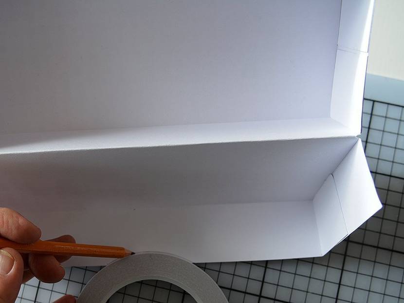 Radius als Griff ausschneiden.
